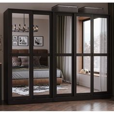 an image of a bedroom with mirrored doors