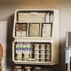 an organized spice rack in the corner of a kitchen