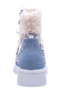 Fluffy faux shearling brings cozy style to a side-zip bootie constructed with lace-up front ties, gleaming stud trim and a grippy lugged sole. 1 1/2" heel 5 1/2" shaft Cushioned footbed Synthetic and synthetic faux-shearling upper/synthetic lining and sole Imported Winter High-top Shearling Boots, High-top Shearling Winter Boots, High-top Shearling Boots For Winter, Flat Heel Winter Boots With Laces, Casual Winter Booties With Plush Lining, Casual Lace-up Boots With Faux Fur Trim, Winter Snow Boots With Lace-up Design, Casual Winter Booties With Lug Sole, Fluffy Casual Winter Boots