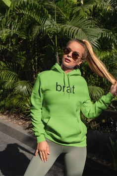 Grab your brat hoodie! 🤍 ABOUT THE HOODIE: *80% cotton, 20% polyester (fiber content may vary for different colors) *Medium heavy fabric (8.3 oz /yd² (280 g/m *Runs true to size, for a baggy look please choose fewer sizes bigger. 📏 SIZES:  This is a unisex hoodie. Please kindly take a look at the table of measurements in the pictures. 🧼 CARE: Machine wash: cold (max 30C or 90F); Non-chlorine: bleach as needed; Tumble dry: low heat; Do not iron; Do not dry clean. 🚚 SHIPPING:  The dates are es Green Stretch Cotton Hoodie, Oversized Green Hoodie With Double-lined Hood, Neon Green Hoodie, Green Graphic Print Hooded Hoodie, Y2k Hoodie, Green Hoodie, Summer Sports, Unisex Hoodies, Sweat Shirt