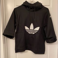 Brand: Adidas Condition:New Without Tags. Size:Xs Color: Black With White Adidas Logo. Details: Hoodie With 3/4 Oversized Sleeves. Adidas Hooded Sportswear Top, Adidas Sportswear Hooded Top, Adidas Hooded Top With Ribbed Cuffs, Adidas White Hooded Top, White Adidas Hooded Top, Adidas Black Sweatshirt With Drawstring Hood, Adidas Hooded Athleisure Top, Adidas Athleisure Hooded Top, White Hooded Adidas Top