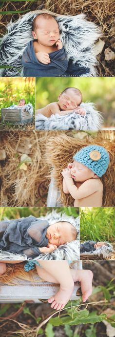 a baby sleeping on top of hay in the grass