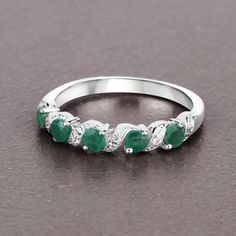 "Emerald Ring, Natural Emerald 5-Stone Sterling Silver Ring for Women, May Birthstone Ring, Green Gemstone Ring, Gift for Her Product Details:  .925 Sterling Silver Stone Details: Emerald Item Type: Ring Subcategory: Emerald Gross Wt: 2.71 Gemstone Wt: 0.54 ctw Total Stone Wt: 0.54 ctw Finish: Rhodium Plated Product Style: 5 Stone Ring Total Qty Of Stones: 13 Height: 3.30 MM Width: 21.59 MM Length: 3.81 MM Primary Stone Color: Green Birthstone Month: May Gender: Women Gemstone Information:  Emer Luxury Sterling Silver Emerald Ring For May Birthstone, Silver Emerald Ring With Birthstone, Round Cut, Sterling Silver Emerald Ring For Everyday, May Birthstone, 14k White Gold Emerald Ring, May Birthstone, Green Multi-stone Emerald Ring In Sterling Silver, Green Gemstone Ring, May Birthstone Rings, Aquamarine Jewelry, Birthstone