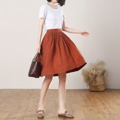 "This Pleated midi skirt is perfect for this summer, Crafted with 100% linen,  featuring elasitc high waist and deep pocket, comfy and versatile ★★FEATURES 100% Linen Back elastic waist Two side pockets Pleated skirt Regular fit A Line skirt No lining Perfect for Summer, Spring, Autumn ★★ Model Size Height approx 162 cm (5′ 4″)  Bust 84 cm (33\")  Waist 66 cm (26\")  She wears size XS. ★★ Bespoke Order Service If you Request other color Request the length Your height is not between 155 cm- 172 c Solid Cotton Pleated Skirt For Summer, Casual Linen Summer Skirt, Casual Full Cotton Skirt, Casual Long Cotton Pleated Skirt, Casual Linen Maxi Skirt, Casual Linen Skirt, Spring Knee-length Solid Color Pleated Skirt, Casual A-line Skirt With Pockets, Linen Midi-length Pleated Skirt