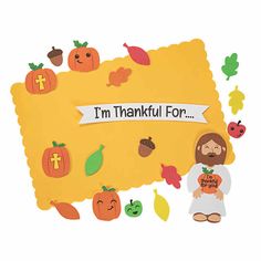 a paper cutout of jesus surrounded by pumpkins and leaves with the words i'm thanksgiving for