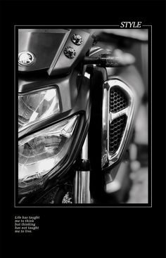 a black and white photo of a motorcycle with the words style on it's headlight