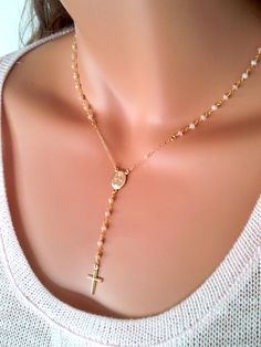 "This is a gorgeous rosary necklace with Genuine Peruvian Pink Opals on 14kt gold filled chain. A gold filled miraculous medallion sits at center of this lovely necklace. A simple and delicate 15mm gold filled cross hangs from the 2 1/2\" drop. Necklace may be ordered in a 16\", 18\", 20\" 22\" or 24\" length around the neck. (Priced accordingly, you choose size) Has spring closer clasp in back. Comes beautifully boxed, the perfect gift! All my jewelry is handmade and made to order. This necklac Gold Rosary As A Gift, Gold Crucifix Necklace With Miraculous Medal, Yellow Gold Rosary With Miraculous Medal As Gift, Gold Jewelry With Miraculous Medal For First Communion, Gold Miraculous Medal Jewelry For First Communion, Handmade Gold Jewelry For First Communion, 14kt Gold Jewelry, Jewelry Cleaning Solution, Rosary Necklace