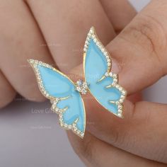 DescriptionSky Blue Enamel Genuine SI Clarity G H Color Diamond Big Butterfly Ring Solid 14K Yellow Gold Unique Wedding Engagement Jewelry ≫ Features• Items Code: SR01438• Metal: 14K Solid Gold (18K also available - Additional fees may apply)• Solid 14K Yellow Gold with stamped• More option in gold color: Rose gold, yellow gold, White gold• Diamonds Wt. : 0.25 Ct• Diamond color : G-H• Diamonds Clarity : SI• Diamonds cut : Brilliant• Blue Enamel Wt.:- • Ring Size 3 to 10 (As per your request)≫ FA Big Butterfly, Diamond Evil Eye, Butterfly Ring, Engagement Jewelry, Diamond Color, Handmade Wedding, G H, White Rose Gold, Minimalist Earrings