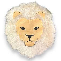 a paper cut out of a lion's head