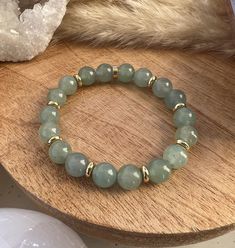 This real natural stone bracelet is composed of 8 mm green aventurine beads and a gold stainless steel separator. ✨💚 Virtues and benefits of green aventurine Mentally/spiritually - Brings luck and good fortune. - Soothes the mind. - Calms nervousness, stress and fears. - Helps with mental calm and inner peace. - Promotes decision-making. - Helps you to be yourself. - Help with creation and brings determination to projects. - Restores humor and cheerfulness. - Brings patience, tolerance On a physical level - Acts on stress and helps make it easier to fall asleep. - Helps with skin problems. - Helps with healing. - Helps detoxify the liver - Promotes the proper functioning of the gallbladder (These beliefs are unique to everyone and are in no way proven medical facts, nor do they replace th Medical Facts, Good Fortune, Natural Stone Bracelets, Green Aventurine, Inner Peace, Stone Bracelet, How To Fall Asleep, Natural Stones, The Help