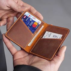 "MENS WALLET, PERSONALIZED Leather Wallet, Front Pocket Slim Design Leather Wallet,Minimalist Credit Card Wallet,Man Leather Wallet LEATHER BIFOLD MINIMALIST WALLET FOR MEN & WOMEN It is perfect gift for Father's Day, Valentine's Day, Christmas, Graduation, Birthday for your dear ones. Our medium bi-fold will replace all those wallets you go through every couple years. SUPER MINIMALIST & SLIM: This wallet is extremely convenient to be carried around in your front or back pocket. PRODUCT Handmade Bifold Card Holder For Daily Use, Handmade Bifold Wallet For Everyday Use, Handmade Bifold Wallets For Everyday Use, Hand-stitched Bifold Card Holder For Everyday Use, Handmade Bifold Card Holder For Travel, Mens Card Wallet, Credit Card Organizer, Minimalist Leather Wallet, Personalized Leather Wallet