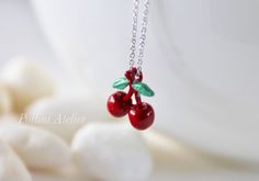 cherry necklace in lipstick red. gold/ silver chain sweet...I love you cherry much :) ♥ pendant size: 15x12mm ♥ total length: around 16 inches + 2 inch extender ♥ metal : gold/ silver plated ♥ lobster clasp ♥ To view more simple and modern necklaces, please go to https://www.etsy.com/shop/PolliniAtelier?section_id=7162802&ref=shopsection_leftnav_3 ♥ Please take note of the sizes and dimensions as they may appear larger or smaller from photos on certain monitors/computers. ♥ Thanks for stoppi Sweet Red Jewelry For Valentine's Day, Cute Handmade Red Charm Necklaces, Cute Handmade Red Charm Necklace, Cute Red Handmade Charm Necklace, Cute Cherry-colored Jewelry For Gifts, Cute Cherry-colored Jewelry Gift, Red Cherry Print Jewelry For Gifts, Trendy Red Charm Necklaces For Gifts, Cute Red Charm Necklace For Gift