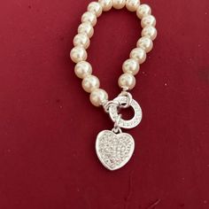 Gloria Pearlesque Heart Charm Bracelet Elegant White Bracelet With Heart Charm, Elegant White Heart Bracelet For Party, Elegant White Charm Bracelet With Heart Charm, Elegant White Pearl Bracelet With Heart Charm, Elegant White Pearl Bracelet For Valentine's Day, Elegant White Heart Charm Bracelet, Avon Jewelry, Vintage Avon, Jewelry Women