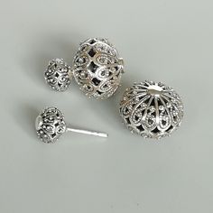 A pair of sterling silver filigree ball studs. The small ball can be inserted into the big ball for closure. Dimensions: Small ball: 7.5 x 8.5mm Big ball: 13 x 16 mm Weight:10.4 gm Price listed is for a PAIR of hoops. These earrings are made of 925 hypoallergenic sterling silver Can be packaged in a gift box. I can include a personal message from you if needed You are welcome to contact me at... bhavnakwintra1956@gmail.com For more beautiful pieces from my shop, please browse 👇 TOE RINGS: https Silver Pierced Round Cartilage Earrings, Elegant Handmade Silver Cartilage Earrings, Elegant Silver Hypoallergenic Piercings, Silver Round Filigree Plug Earrings, Silver Filigree Plug Earrings, Elegant Silver Sterling Silver Piercings, Unique Silver Piercings As Gift, Unique Silver Piercings For Gift, Elegant Nickel-free Silver Piercings