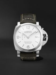 The 'Luminor Marina' watch is modelled after diving styles Panerai engineered for the Royal Italian Navy back in the 1940s. Featuring original design details, including a cushion-shaped stainless steel case, small seconds dial and crown-protecting bridge, this Swiss-made version is powered by an automatic P.9010 calibre that was developed at the label's manufacture in Neuchâtel. It has a signature sandwich dial, the cutouts on the top layer allow the luminescence to shine through, and is fitted Panerai Luminor Marina, Luminor Marina, Panerai Luminor, Special Ops, Duke University, Green Suede, Men's Watches, Luxury Watches For Men, Dive Watches