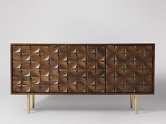 the sideboard is made out of wood and has an unusual design on it's sides