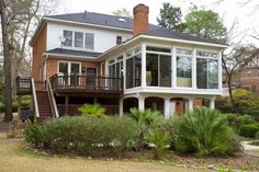 a large white house with lots of windows