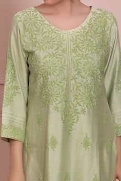 Green kurta with all-over embroidery and v-neck. Paired with straight pants.
Component: 2
Embroidered
Neckline: V-Neck
Sleeve Length: Three Quarter
Fabric: Chanderi
Color: Green
Badal, mukaish, chikankari and embellishments
Straight fit pants - Aza Fashions Chikankari Kurta, Straight Fit Pants, Embroidered Neckline, Fashion App, Fit Pants, Pant Set, Straight Pants, Set For Women, Aza Fashion