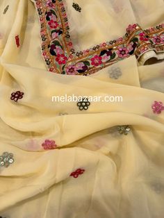 Pale yellow georgette dupatta with colorful embroidered border. Yellow Embroidered Salwar Kameez For Eid, Handwork Dupatta For Eid Celebration, Eid Celebration Dupatta With Handwork, Festival Cream Dupatta With Mirror Work, Cream Dupatta With Mirror Work For Festivals, Cream Salwar Kameez With Embroidered Border For Festivals, Unstitched Georgette Blouse Piece With Embroidered Border, Festive Cream Dupatta With Mirror Work, Yellow Embroidered Unstitched Blouse Piece