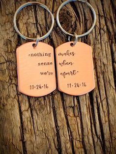 two keychains with the words nothing makes sense when we aren't