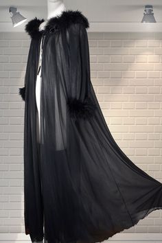 "Magnificent black double layered nylon full length dressing gown/robe by Jenelle of California. Long, sweeping gown, full floaty nylon, 3/4 sleeves, fluffy black marabou trim around the cuffs and collar - total Hollywood glamour. In good cared for condition. Size large on the label: Chest:  up to 48\" chest (does measure larger, but make allowance for movement - you don't have to be large to wear this by the way - it depends on the fit that you would like. Nape to hem:  54.5\" Please ask if you Stylish Gown, Black Ball Gown, Aesthetic Dress, Dressing Gown Robe, Fall Dress Outfit, Dress Aesthetic, Black Gown, Mod Dress, Womens Robes