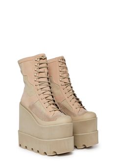 have adjustable lace-up closures, embroidered logo details, and pull tabs on the back. These wedge boots feature a double stacked platform design and a paneled faux suede and leather construction. Dolls Kill Platform Boots, Tan Platform Boots, Concert Boots, Wedge Platform Boots, Rave Clothes, Platform Design, Fishnet Top, Mesh Tops, Punk Rave