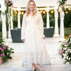 Elevate your fall wardrobe with our Women's Lace Long Sleeve V Neck Maxi Dress. Perfect for casual boho vibes or as a charming wedding guest outfit, this dress features delicate lace detailing and a flattering smocked waist. Cream Lace Trim Dress For Fall, Flowy Lace Trim Dress For Fall, Lace Trim Maxi Dress For Fall, Fall Cream Dress With Lace Trim, Maxi Dress With Lace Trim For Fall, Fall Maxi Dress With Lace Trim, Chic Fall Maxi Dress With Lace Trim, Spring Flowy Lace Patchwork Maxi Dress, Spring Modest Dress With Lace Trim