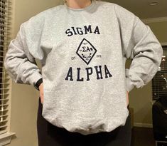 Sigma Alpha Crest crewneck sweatshirt Silly Clothes, Silly Shirt, Things I Need To Buy, Sigma Alpha, Alpha Sigma Alpha, Really Cute Outfits, Cute Simple Outfits, Quick Jokes, Preppy Outfits