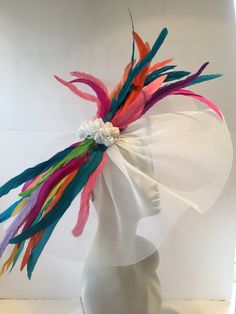 Multi color Fascinator- Large Brim- Breeders Cup- Wedding Fascinator- Cocktail Hat - Kentucky Derby- Horse Races Hello, Have fun walking into your next party/event wearing this big bright stunning fascinator. It will definitely be a head turner! This feather fascinator is about 20 inches round. It has feathers scattered It is center....it's attached to a skinny adjustable headband that is wrapped in satin and is very comfortable. ------------------------------------------------- I ship US Postal Whimsical White Costume Hats And Headpieces For Party, Multicolor Costume Hats For Royal Ascot Races, Multicolor Costume Hats And Headpieces For Royal Ascot, Multicolor Kentucky Derby Headpiece, Fitted Multicolor Party Hat, Whimsical Multicolor Fascinator For Kentucky Derby, Fitted Multicolor Headpiece For Carnival, Multicolor Headpiece For Kentucky Derby Party, Elegant Multicolor Carnival Headpieces