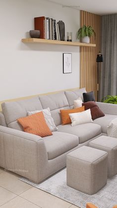 a living room filled with lots of furniture next to a wall mounted book shelf and window