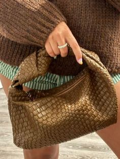 Elevate your everyday look with our luxurious brown woven knotted shoulder bag/tote. Crafted from high-quality materials, this stunning accessory is both stylish and functional, perfect for carrying all your essentials in style. The intricate woven design and knotted detailing add a touch of sophistication to any outfit, while the spacious interior provides plenty of room for your phone, wallet, keys, and more. Whether you're running errands or heading out for a night on the town, this versatile Versatile Brown Hobo Bag With Braided Handles, Brown Rectangular Bag With Interwoven Design, Brown Rectangular Bags With Interwoven Design, Brown Shoulder Bag With Braided Handles For Fall, Trendy Brown Woven Leather Bags, Chic Brown Bags With Intrecciato Weave, Chic Brown Bag With Intrecciato Weave, Brown Tote Shoulder Bag With Interwoven Design, Everyday Brown Bags With Interwoven Design