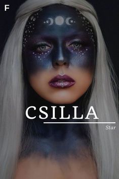 a woman's face with black and white paint on it, the words csilia written