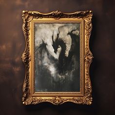 a painting hanging on the wall next to a wooden frame with an image of a dragon