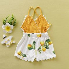 Summer FUN in this gorgeous lemon romper. Every beauty needs this. Cute Summer Floral Print Bubble Romper, Cute Bubble Romper For Spring Garden Party, Cute Bubble Romper For Garden Party In Spring, Chic Cotton Floral Print Jumpsuits And Rompers, Spring Bubble Romper For Garden Party, Summer Cotton Bubble Romper With Floral Print, Summer Bubble Romper With Floral Print, Summer Floral Print Cotton Bubble Romper, Yellow Cotton Bubble Romper For Summer