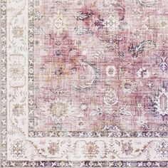 an area rug with various colors and patterns on it, including pinks, purples,