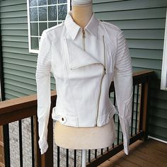 White, Long Sleeve Jacket With Ribbed Sleeves And Front Zippers For Closure And Support. Made In China. 90% Polyester, 10% Nylon. Hand Wash In Cold Water. S - Bust 32”, Waist 28”, Shoulder To Hem 18”, Shoulder To Shoulder 14”, Sleeve Length Is 23-1/2”. M - Bust 34”, Waist 30”, Shoulder To Hem 18-1/2”, Shoulder To Shoulder 14-1/2”, Sleeve Length 24” L - Bust 36”, Waist 32”, This Jacket Is New And In Excellent Condition. All Of My Prices Are Negotiable. Each Item Has Been Priced Based Upon The Qua Fitted White Outerwear With Zipper Closure, White Fitted Outerwear With Zipper Closure, White Outerwear With Zip Fly For Fall, White Biker Jacket With Zipper For Spring, Chic Stretch White Outerwear, Chic White Stretch Outerwear, White Zipper Closure Outerwear For Work, White Spring Outerwear With Zipper Closure, Chic White Outerwear With Zipper Closure