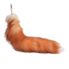 an orange furry animal keychain hanging from a chain