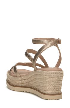 An espadrille-inspired wedge adds lift and earthy style to a standout sandal topped with smooth leather straps. 3" heel; 1 1/2" platform Leather upper/synthetic lining/rubber sole Imported Casual Gold Platform Wedge Sandals, Espadrille Wedge Sandals With Heel Strap, Summer Wedge Sandals With Platform Espadrille, Summer Platform Wedge Espadrille Sandals, Summer Espadrille Wedge Sandals With Platform, Straw Wedge Sandals With Ankle Strap And Cushioned Footbed, Straw Wedge Sandals With Cushioned Footbed And Ankle Strap, Synthetic Platform Wedge Heel Espadrilles, Straw Wedge Sandals With Heel Strap