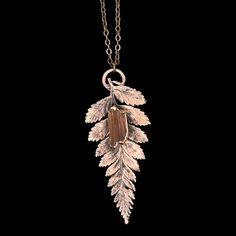 Presenting our Hematite Quartz pendant--a genuine leaf and copper creation. Suspended from a 18-inch copper cable adjustable chain, this piece features Hematite Quartz, known for its grounding and balancing properties. The electroforming process captures every detail of the leaf, making each pendant unique. This piece is a simple yet meaningful way to stay connected to nature. Real Leaf, Copper Leaf, Real Leaves, Inspired Necklace, Botanical Jewelry, Plant Lover Gift, Leaf Nature, Leaf Necklace, Stay Connected