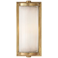 an outdoor wall light with pleated glass panels on the outside and brass finish frame