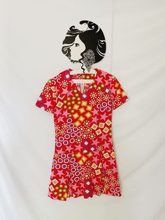 A fresh run of true vintage dresses are dropping this week. I will include brand, sizing, measurements, material, and any additional notes. Please refer to photos.  Brand: unknown Tagged size: unknown Material: cotton Pit to pit: 16" Shoulder: 14" Waist: 28.5" Hip: 31" Length: 31" Notes: short sleeve fit and flare style dress, likely handmade (no tags), beautiful vibrant confetti pattern, cotton material. Back metal zipper closure. *A little to snug for my mannequin so I don't have photos of her Vintage V-neck Mini Dress For Summer, Vintage Cotton V-neck Dress, Retro A-line Dress With Vintage Print, Vintage Floral Print V-neck Mini Dress, Casual Short Sleeve Dresses For Vintage Fashion, Retro Summer Vintage Dress With Vintage Pattern, Retro Vintage Dress With Summer Pattern, Retro Summer Dresses With Vintage Pattern, Retro Vintage Dress With Vintage Pattern For Summer