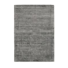 a gray rug on a white background with no one in it or someone out there