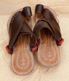 Use code COMBINEDSHIPPING and get $50 off your second pair. Check out all men's leather sandals: https://www.etsy.com/shop/sandcruisers/?section_id=25459641 You will love these traditional Arabian sandals. The straps and soles are made of leather. The leather lining will feel so soft and comfortable against your foot. They are designed to fit your foot loosely with lots of room in the toe-ring and straps. The leather sole will mold and shape to your foot over time, even creating an arch against Traditional Leather Sole Flip Flops For Beach, Traditional Brown Leather Flip Flops, Vacation Brown Toe Ring Sandals With Rubber Sole, Traditional Brown Toe Ring Sandals For Vacation, Leather Sandals For Vacation Festivals, Traditional Brown Flip Flops For Vacation, Brown Sandals For Vacation And Festivals, Brown Leather Sandals For Festivals, Brown Sandals For Beach Festivals