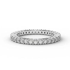 a white gold wedding band with round cut diamonds