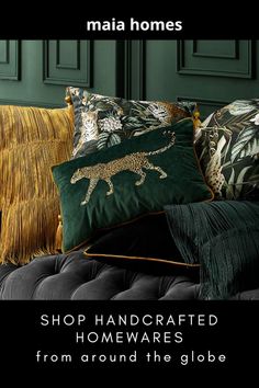 a couch with pillows on it and the words shop handcrafted homewares from around the globe