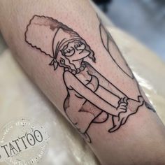 a person with a tattoo on their arm