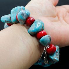 ✦Gemstone: Natural Kingman Turquoise, Coral ✦Color: Blue, Red ✦Shape: Nugget ✦Length: 6''-8'' ✦Bead Size: Big Rough Nugget:25x17x6mm Small Rough Nugget:17x12x7mm Red Coral:11x7mm ✦Weight: 355.5ct ✦QTY: 1 pcs / package ♕Beautiful & High Quality Findings♕ You will receive the same quality has you see in picture. CLICK BELOW TO CHECK ALL OUR BEAUTIFUL GEMSTONE BRIOLETTES. https://www.etsy.com/shop/TurquoiseFactory?ref=seller-platform-mcnav Color may vary slightly due to your monitors' color cal Southwestern Style Red Beaded Bracelet As Gift, Southwestern Style Red Beaded Bracelets For Gift, Red Gemstone Beaded Bracelet Bohemian Style, Gift Red Coral Bracelet With Gemstone Beads, Red Bohemian Beaded Gemstone Bracelet, Turquoise Hand-strung Healing Bracelets, Turquoise Hand-strung Stretch Bracelet, Turquoise Hand-strung Stretch Bracelet For Beach, Adjustable Hand-strung Coral Bracelets