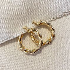 These 18k Gold Filled 30mm Double Twisted Tube Hoop Earrings are expertly handcrafted to ensure a luxurious, high-quality look. Perfect for any outfit or special occasion, they make a great gift. 18k Gold Filled 30mm Double Twisted Tube Hoop Earrings Metal: 18k Gold Filled Measures 30 mm external diameter x 5 mm hollow twisted tube. Weights 8.7 grams/pair Hypoallergenic jewelry - Nickel Free Water-resistant Rigorously manufactured under CA Prop 65 and EU standards Made in Brazil Tube Hoop Earrings, Pearl Rosary, Horn Pendant, Rosary Bracelet, Earrings Metal, Hypoallergenic Jewelry, Denim Accessories, Birthstone Charms, Gold Filled Jewelry