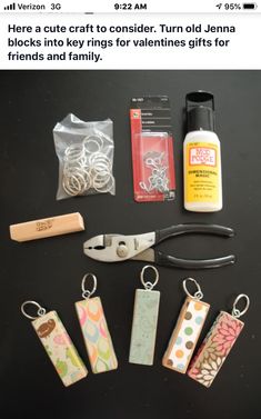 some crafting supplies are laid out on a table with scissors, glue, and other items