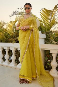 Lime yellow saree with badla placement embroidery and gota embellished border. Paired with mukaish work padded blouse. - Aza Fashions Badla Work Saree, Yellow Pre-draped Saree With Resham Embroidery, Yellow Georgette Pre-draped Saree With Pallu, Yellow Resham Embroidery Blouse Piece For Diwali, Diwali Yellow Blouse Piece With Resham Embroidery, Pista Green Georgette Saree With Gota Work, Semi-stitched Yellow Saree With Sheer Dupatta, Yellow Bollywood Blouse With Resham Embroidery, Yellow Bollywood Designer Blouse Piece